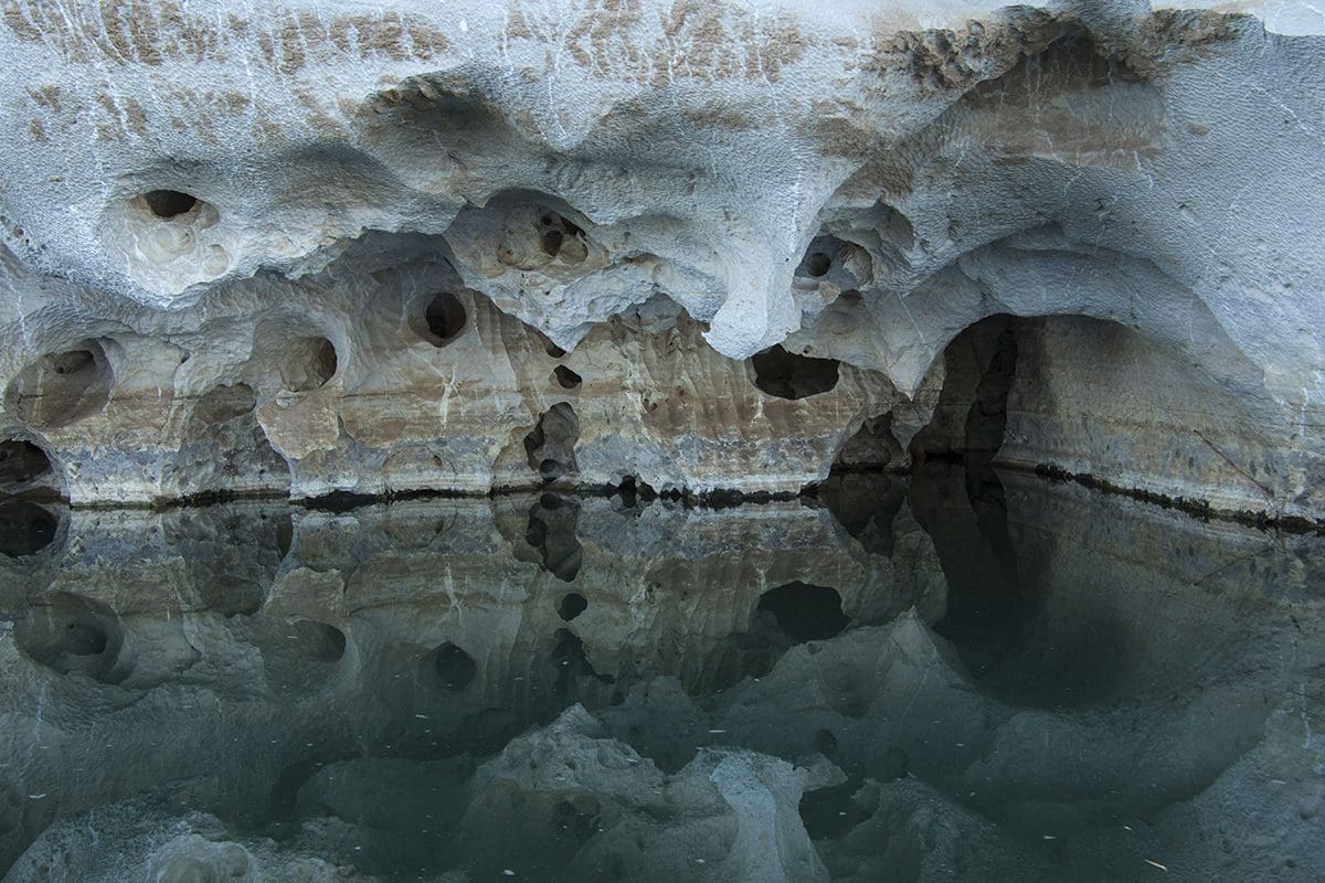 An image of a cave with water in it.