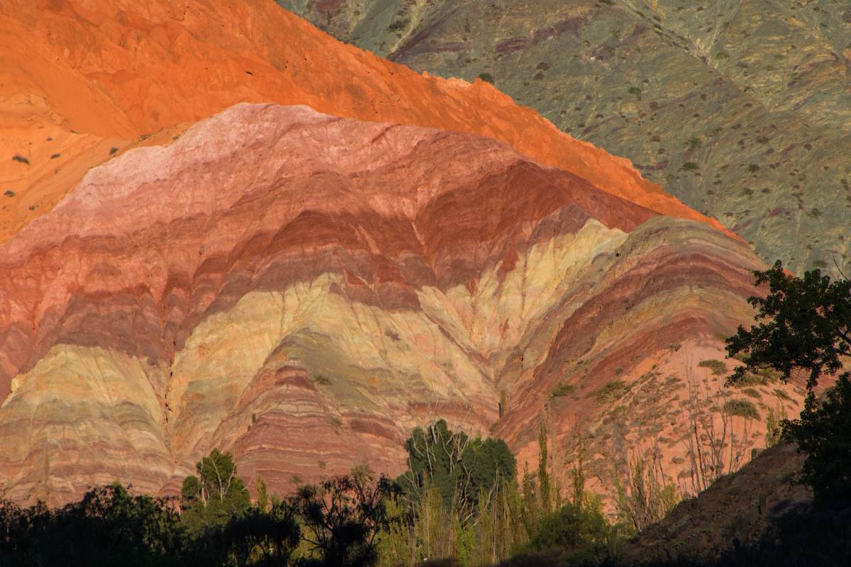 A mountain with many different colors on it.