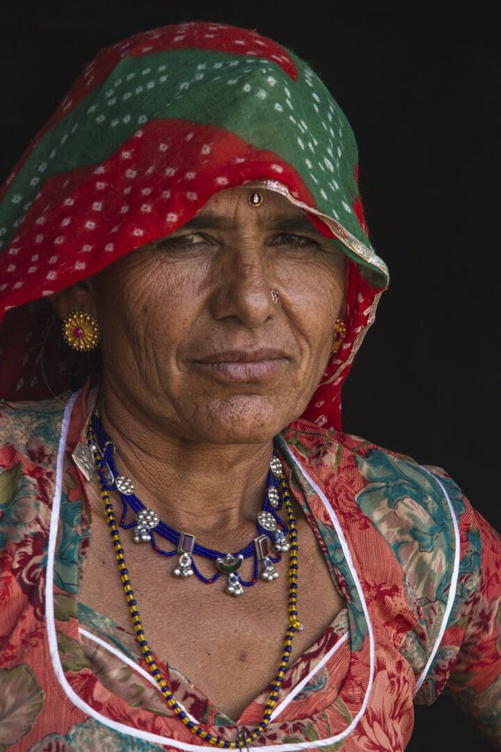 An indian woman wearing a colorful sari.