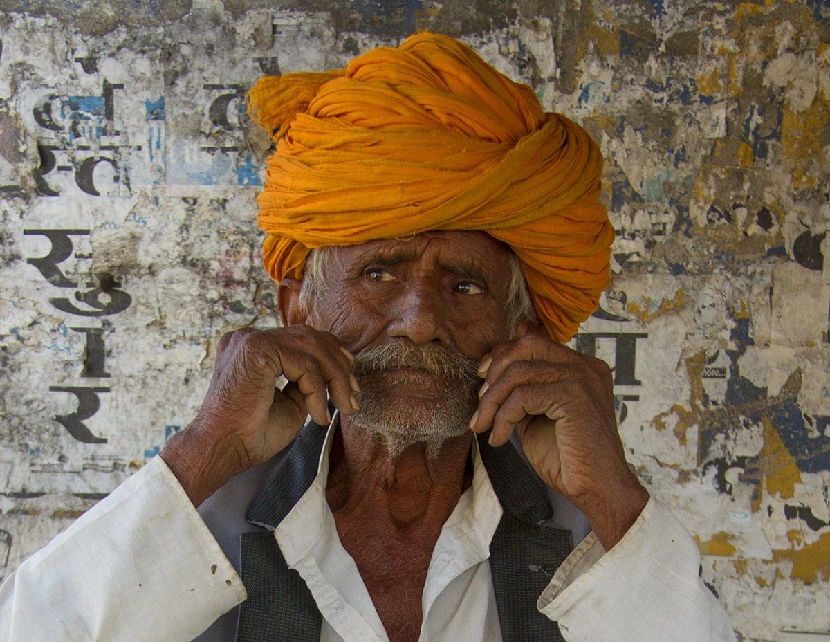 An old man wearing a turban.