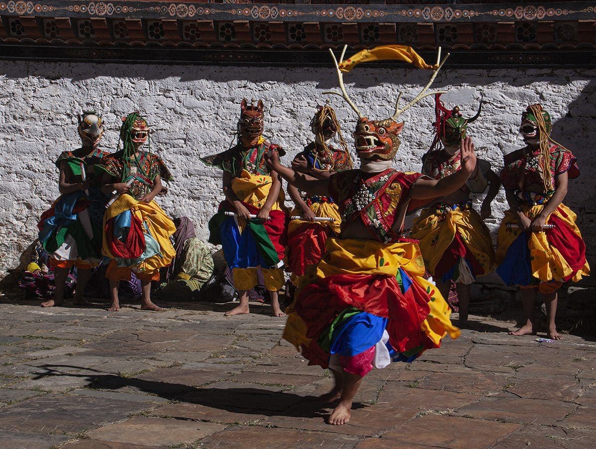 A group of dancers in colorful costumes.