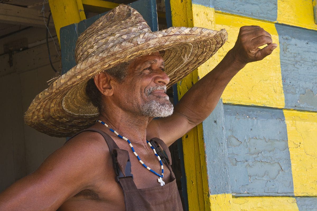 A man wearing a straw hat.