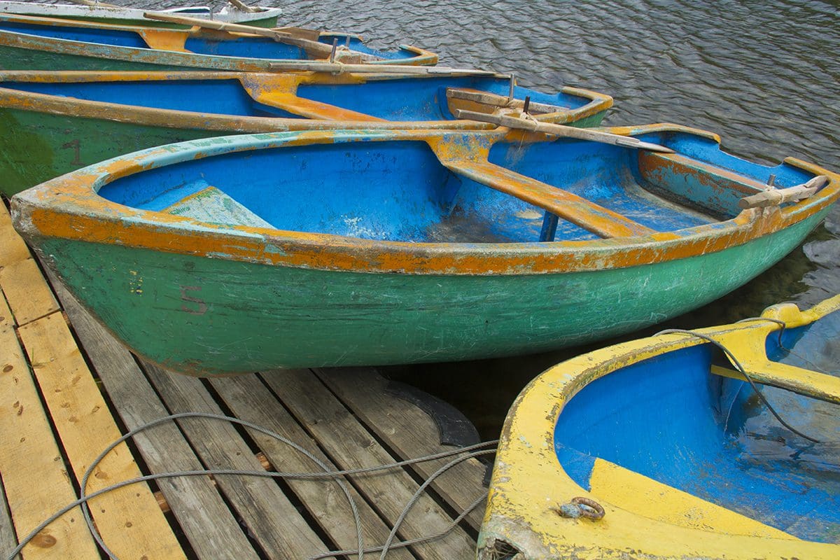 A group of boats on a dock.
